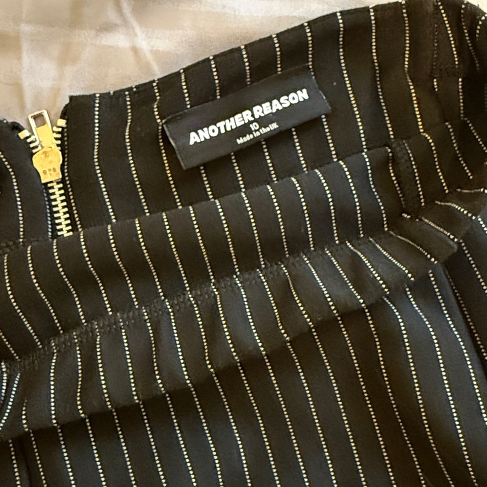 Another Reason Strapless Black Pinstripe Jumpsuit With Silver Chain View 2